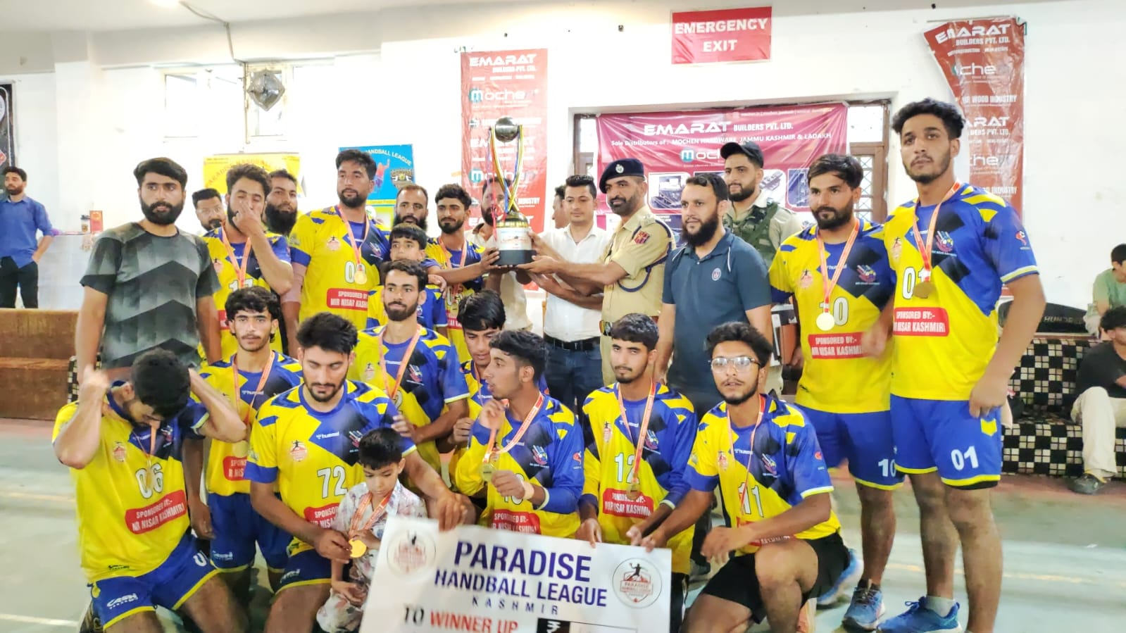 Paradise Handball League Season 1 team celebrating with their trophy